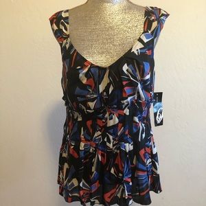 Nine West sleeveless nice printed in nice blouse splits back and front size 14